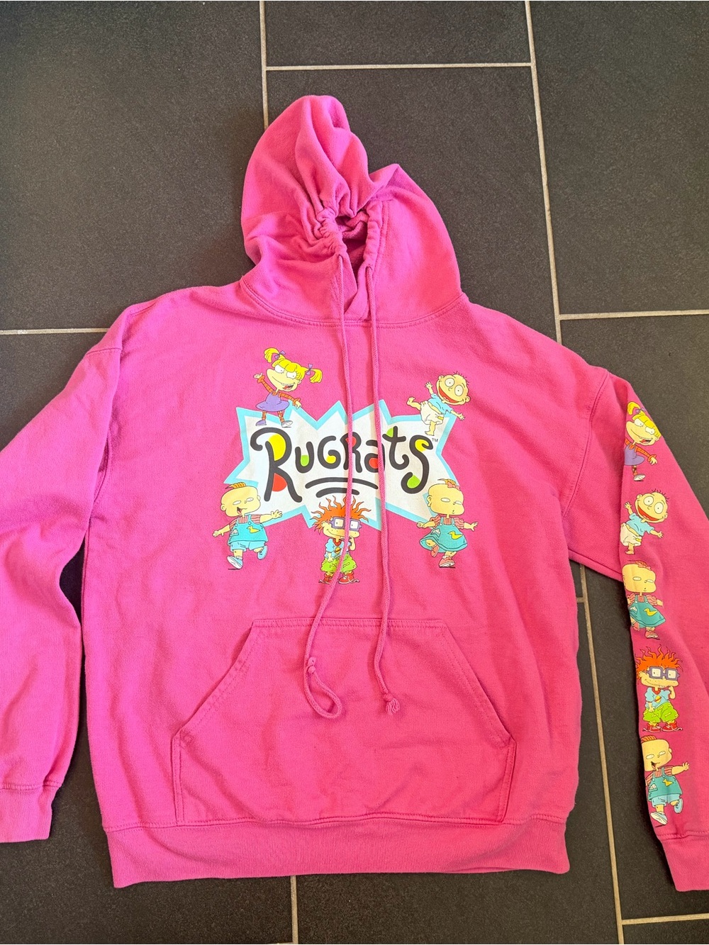 Vintage Nickelodeon Rugrats pullover hoodie in bright pink, featuring the Rugrat
